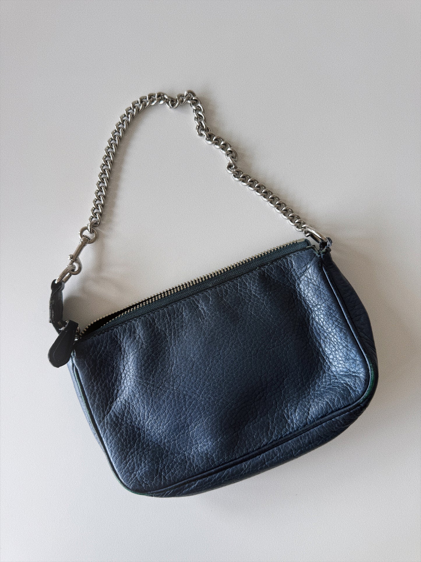 small blue coach handbag back