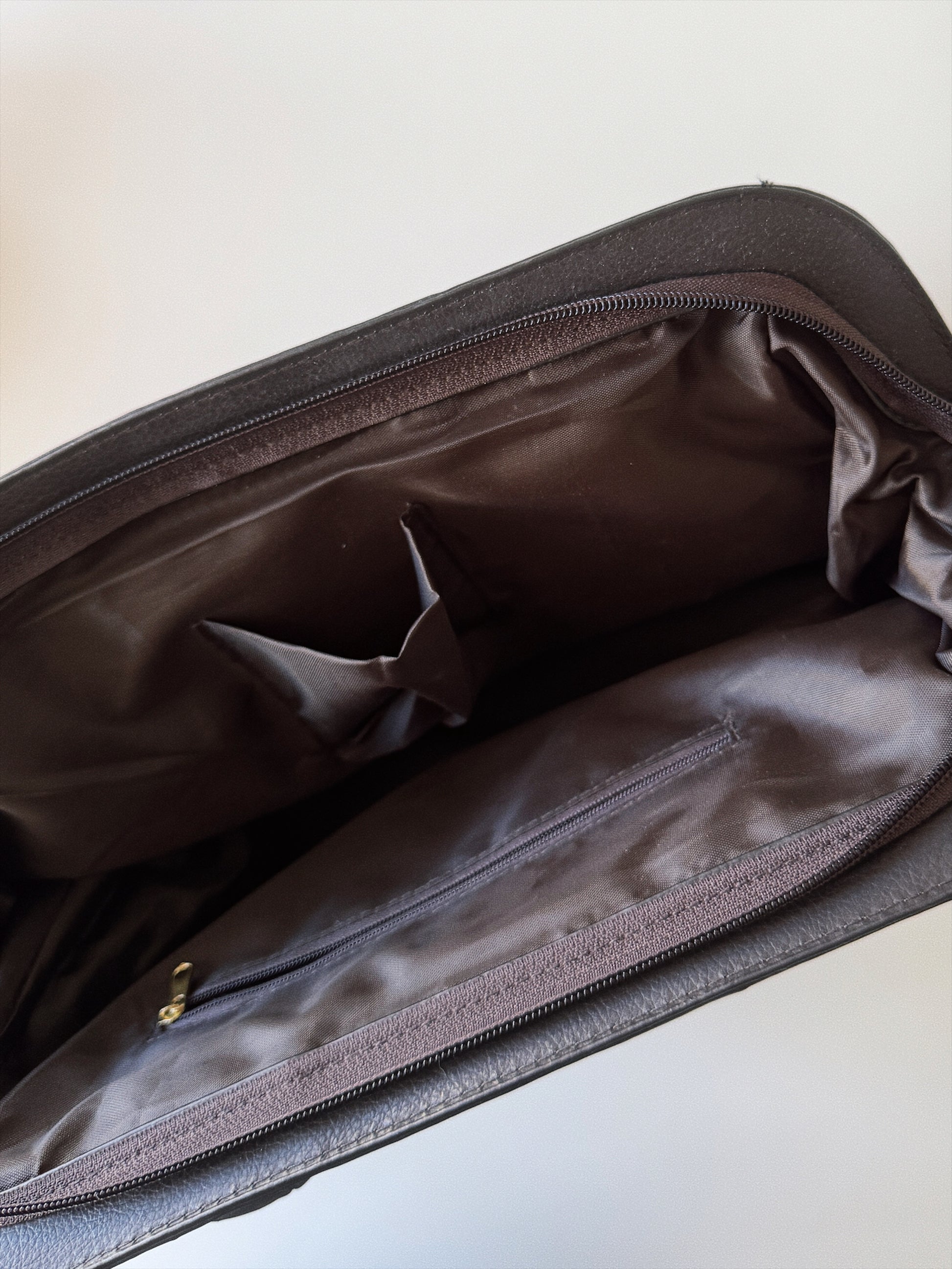 large vintage dark brown handbag inside