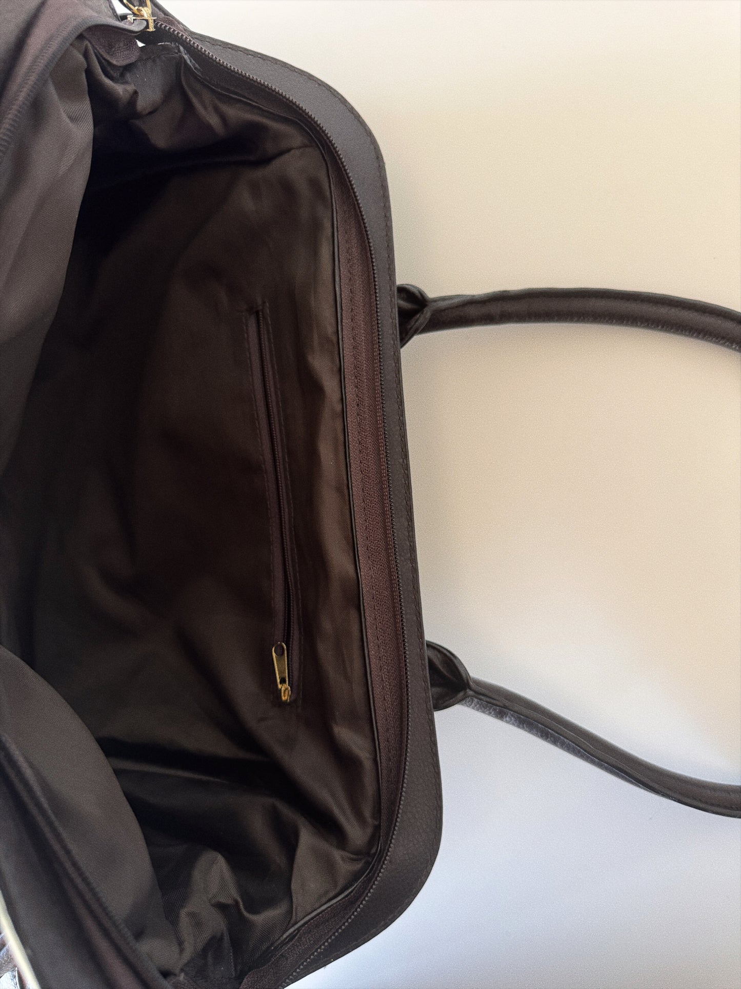 large vintage dark brown handbag inside