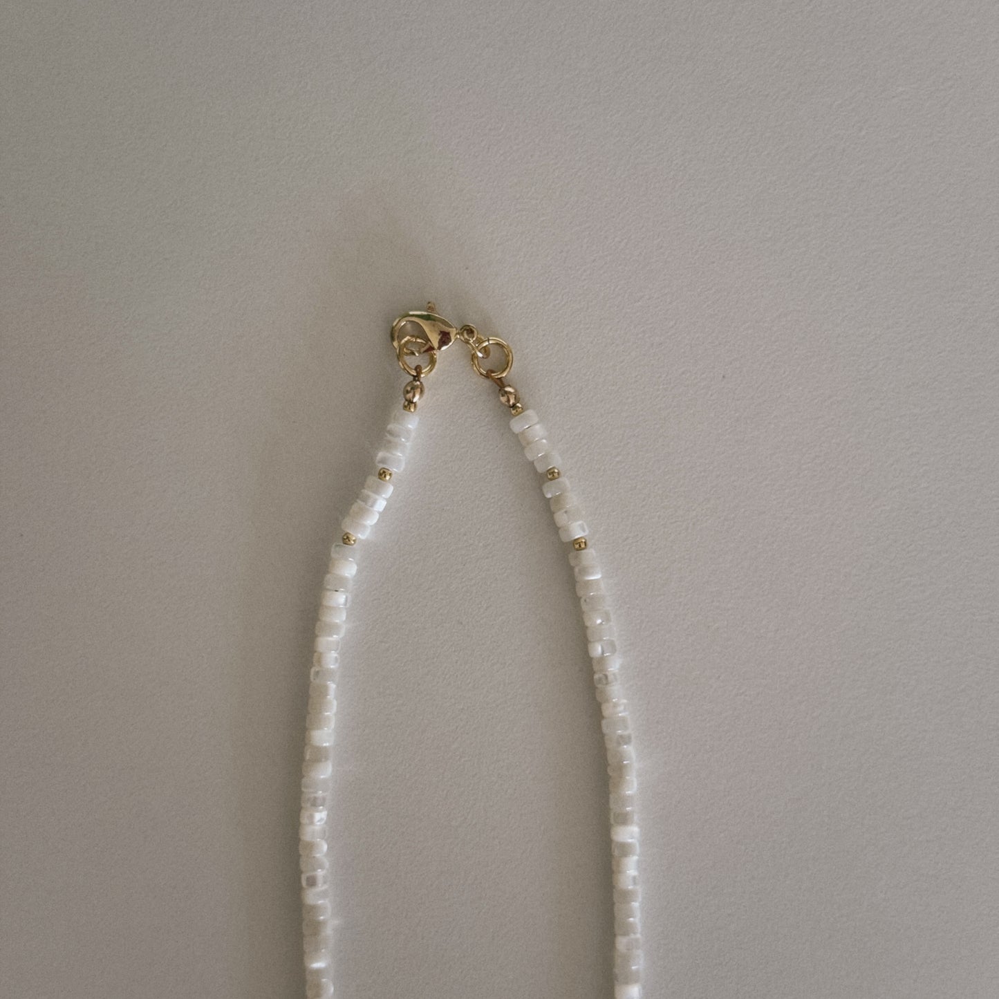 long mother of pearl beaded necklace