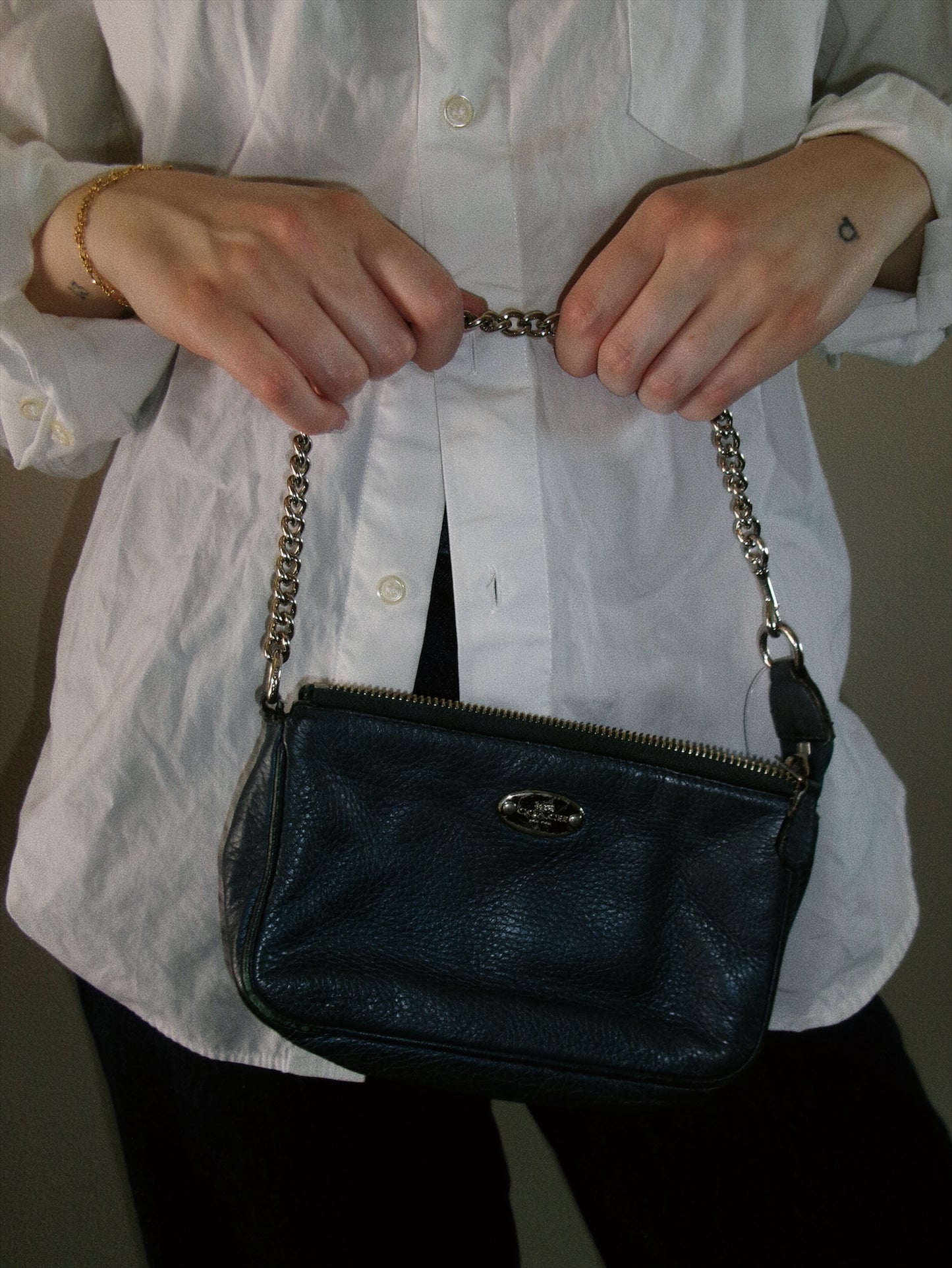 small blue coach handbag