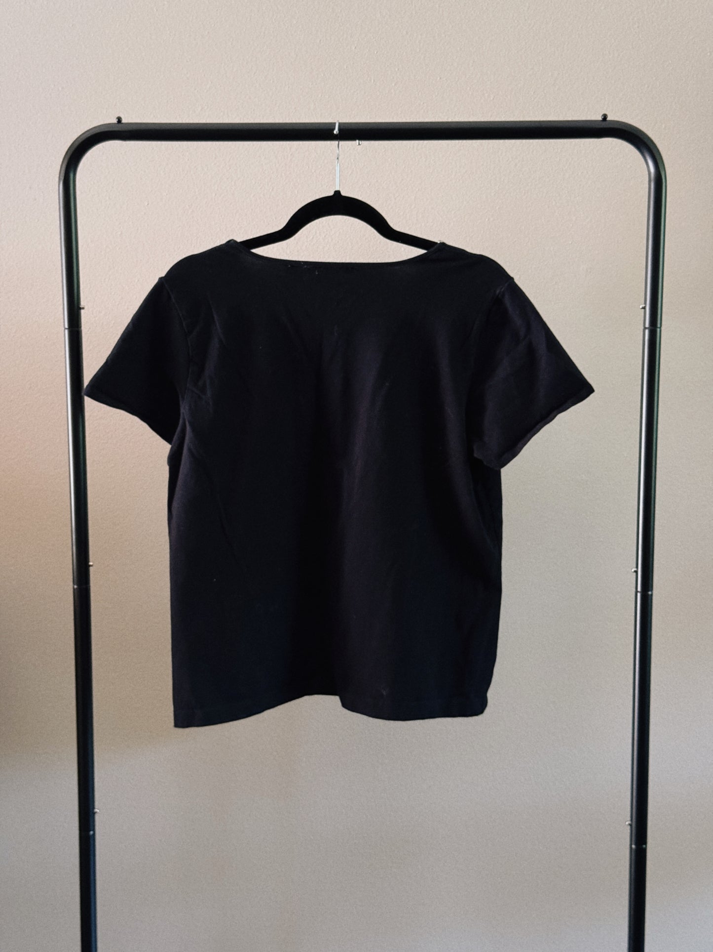 black tee with neckline detail