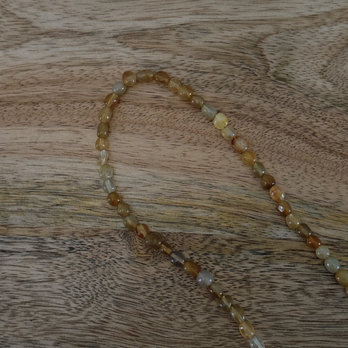 orange and yellow glass beaded necklaces with 18k gold filled carabiner