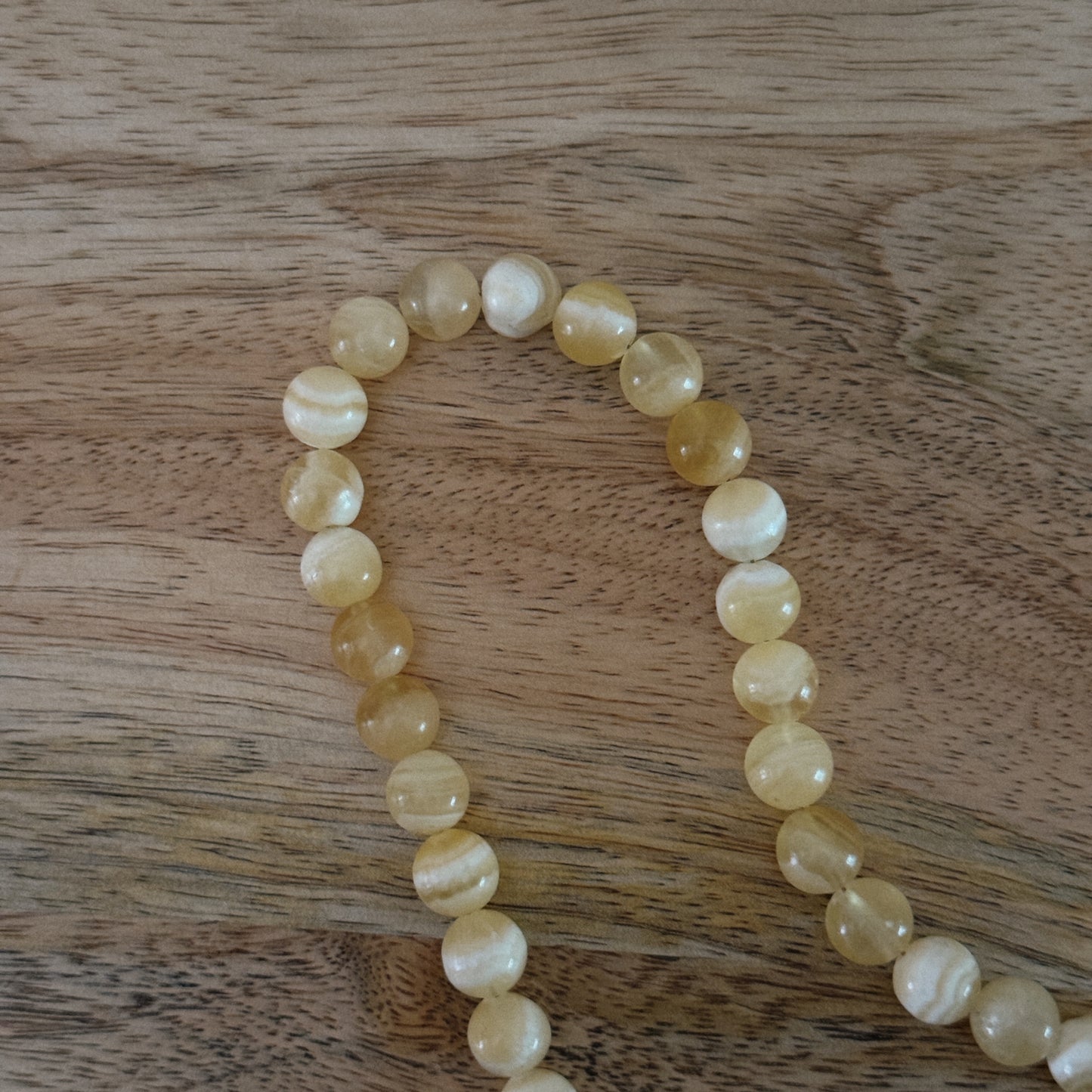 yellow glass beaded necklace with 18k gold filled carabiner