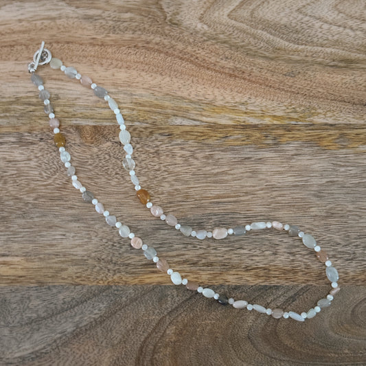 long mixed glass beaded necklace with silver antique clasp