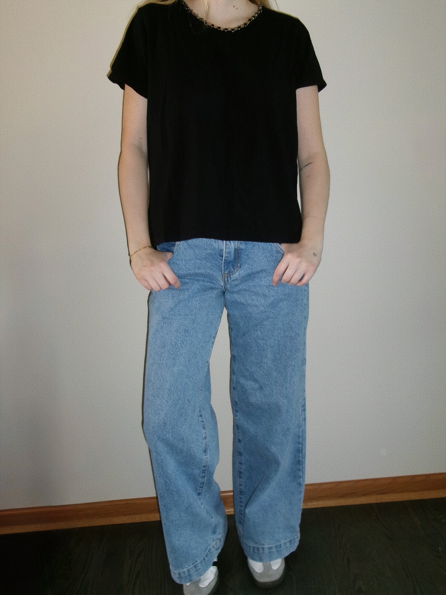 vintage black tee with metal detail around neckline full outfit