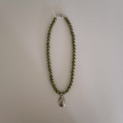 avocado beaded necklace with oyster pendant