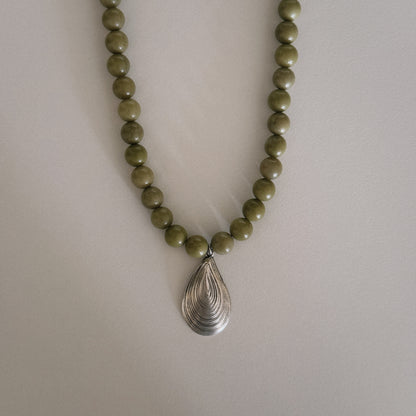 avocado beaded necklace with oyster pendant
