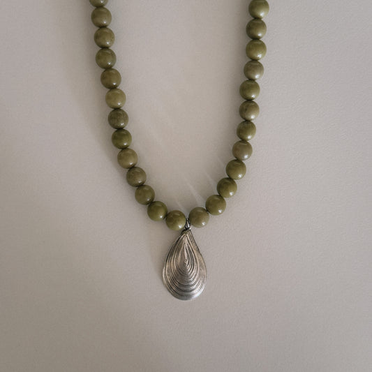 avocado beaded necklace with oyster pendant