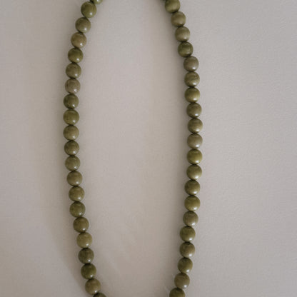 avocado beaded necklace with oyster pendant