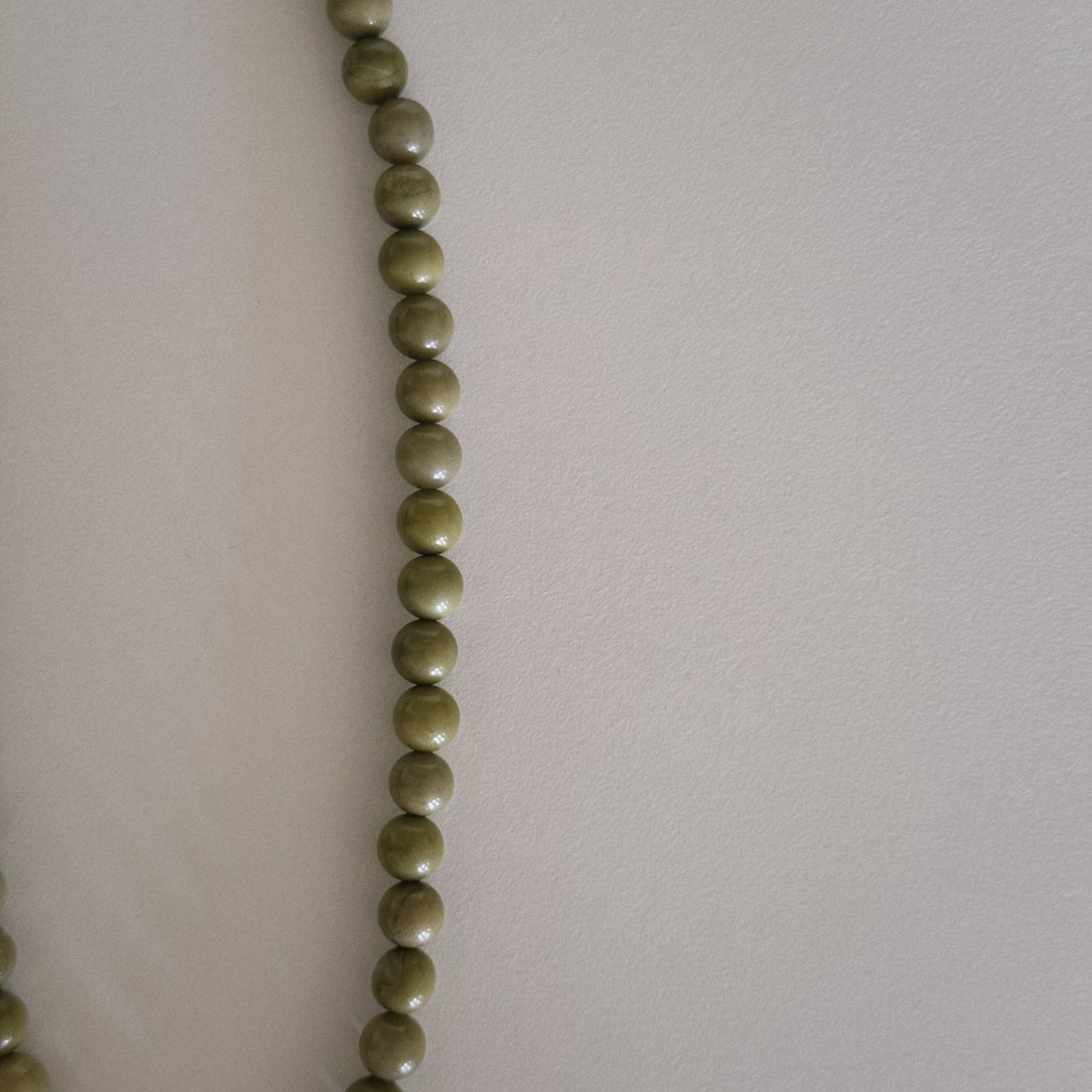 avocado beaded necklace with oyster pendant