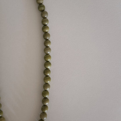 avocado beaded necklace with oyster pendant