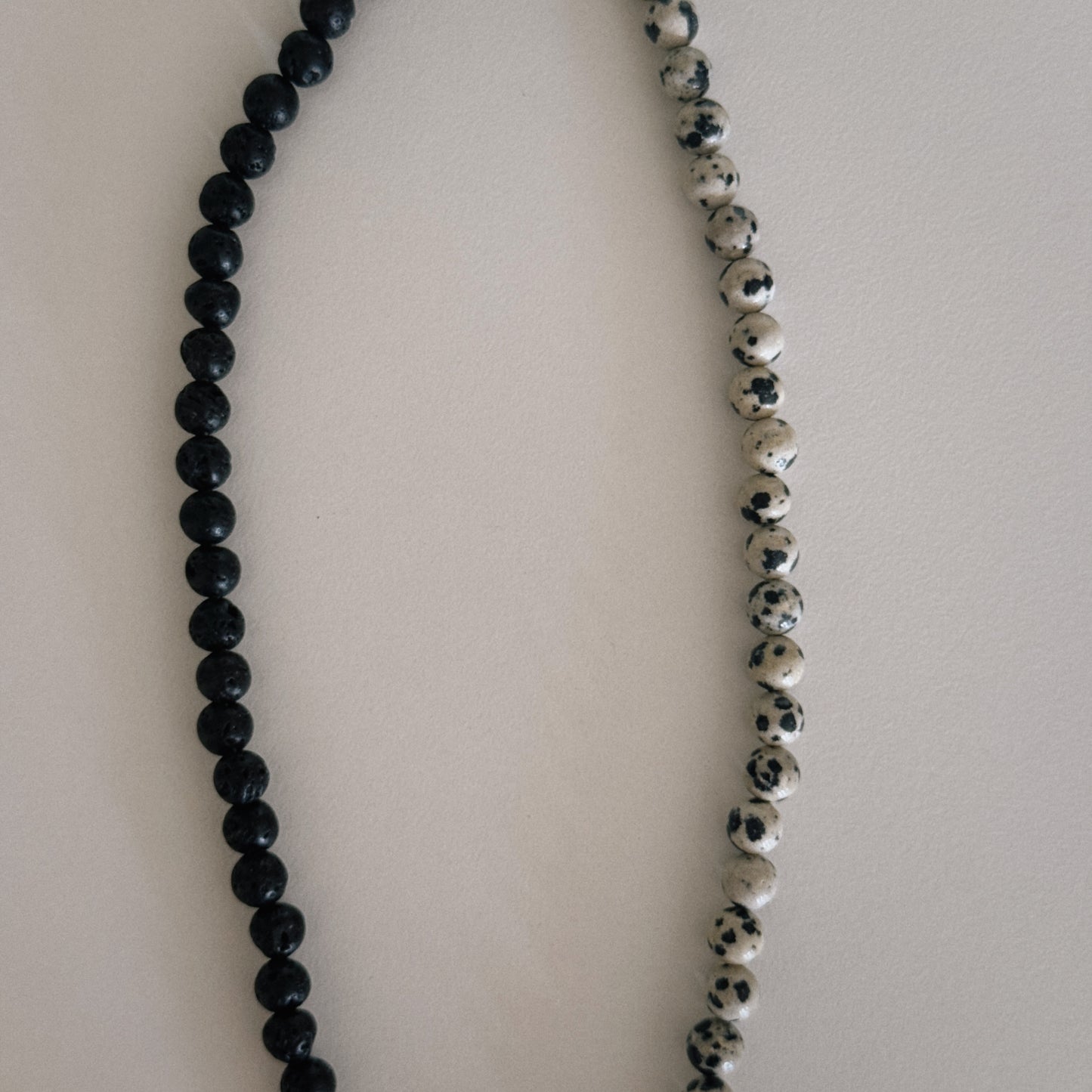black lava & dalmation beaded necklace with spiral pendant