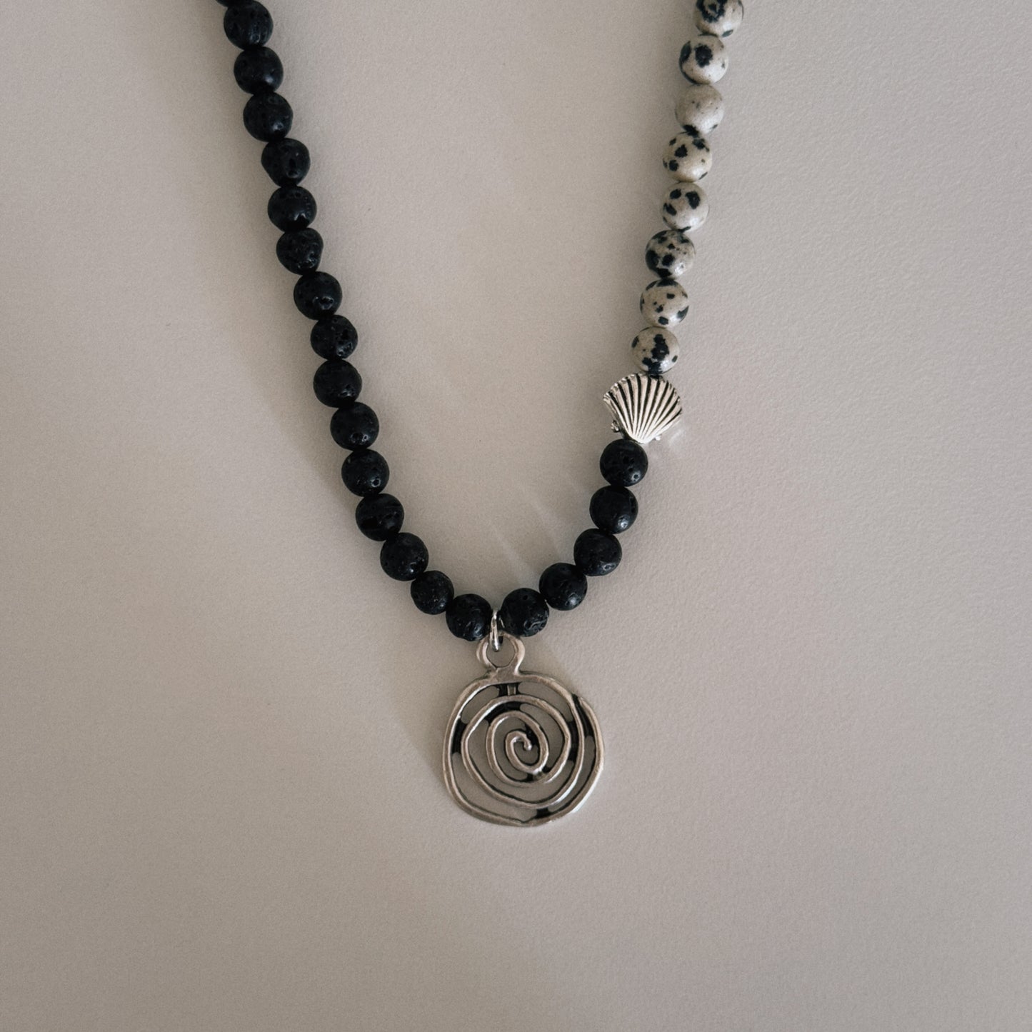 black lava & dalmation beaded necklace with spiral pendant