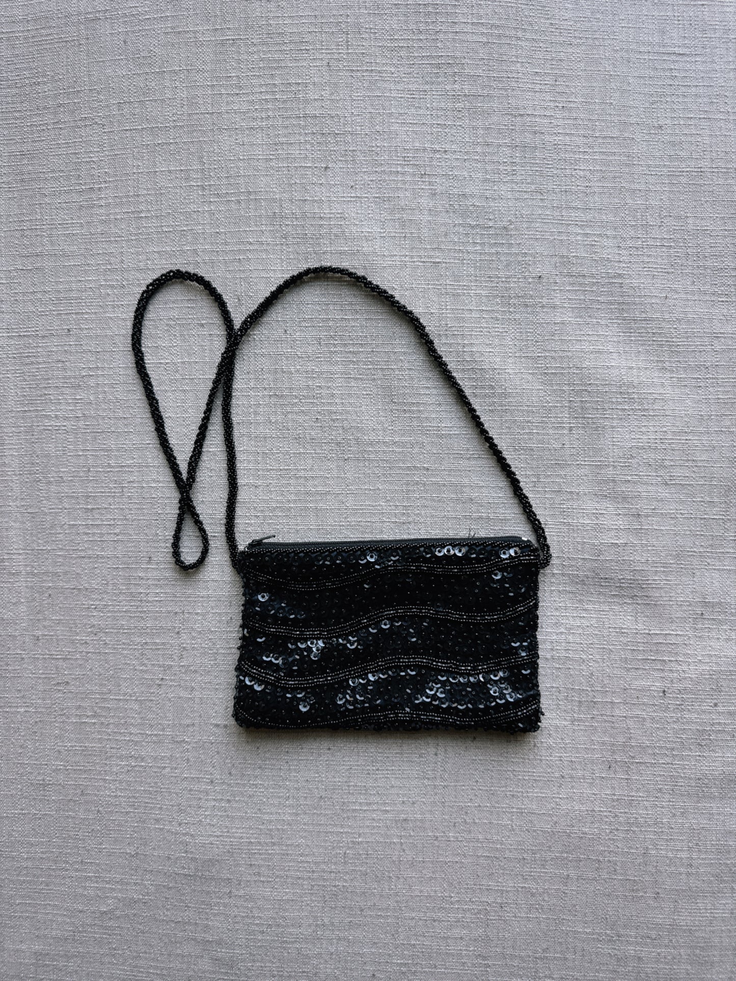 black sequin bag