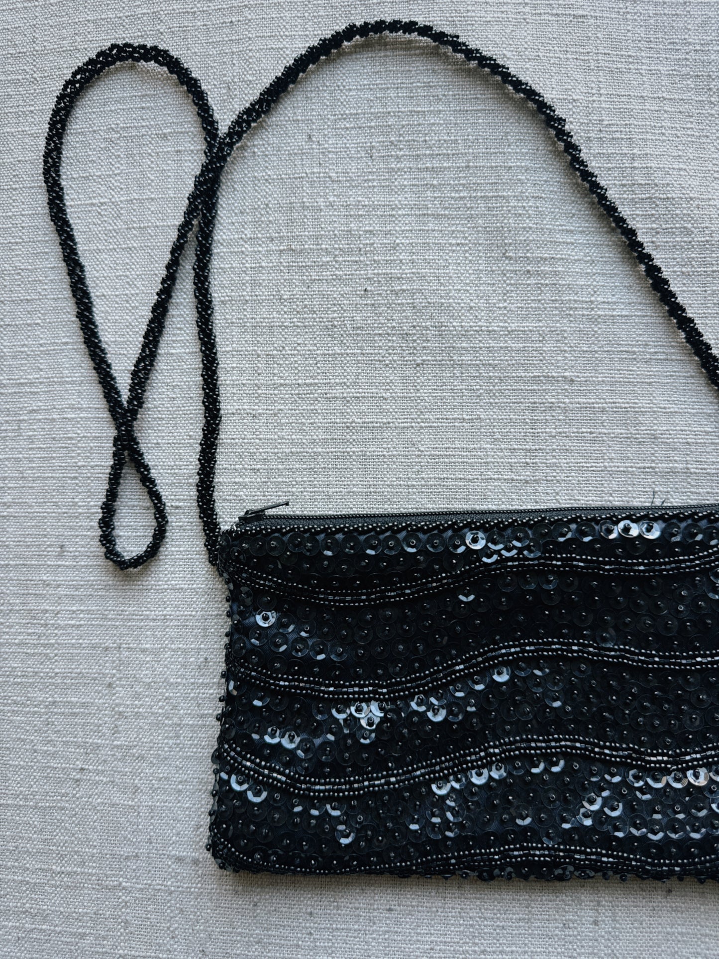 black sequin bag