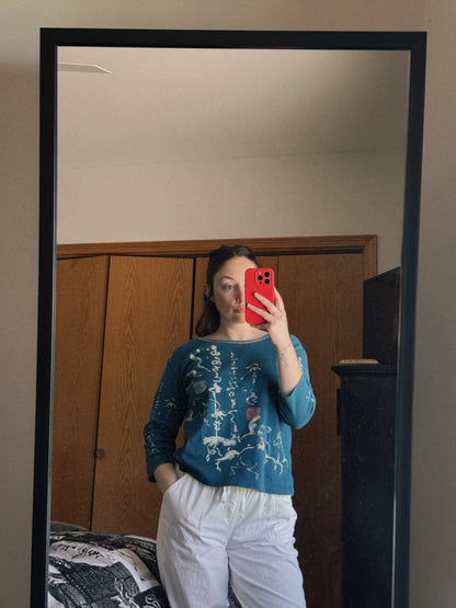 teal calligraphy top