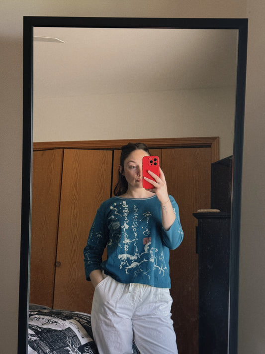 teal calligraphy top