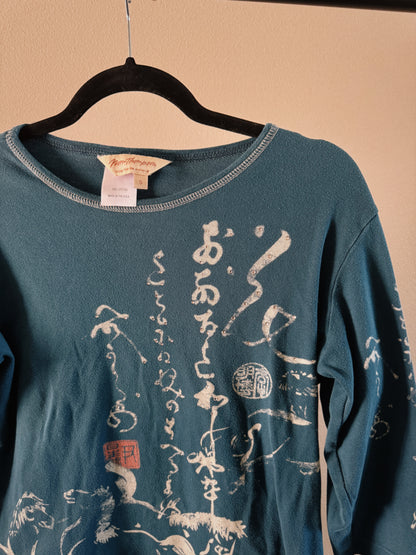 teal calligraphy top
