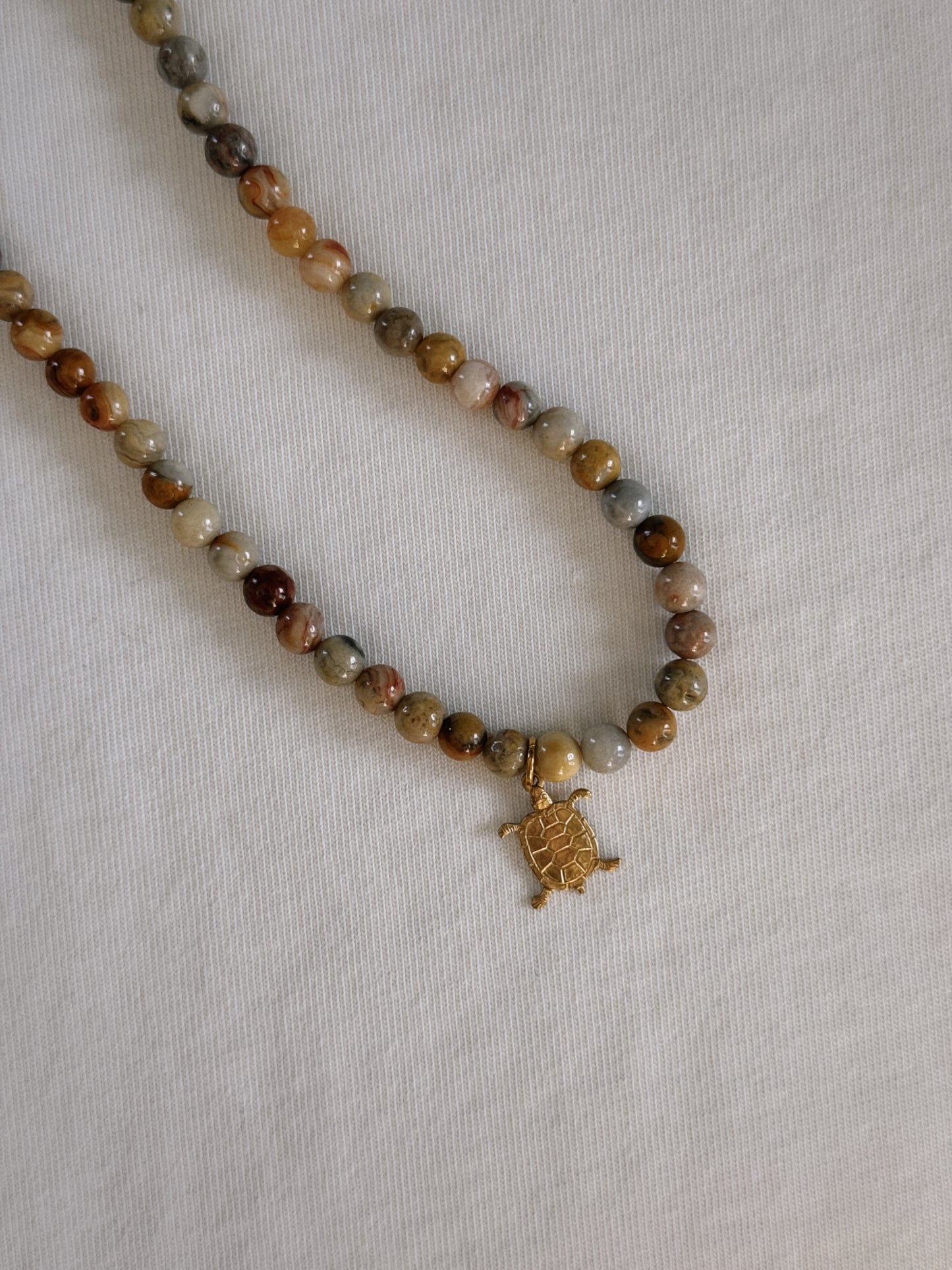 brass turtle beaded necklace