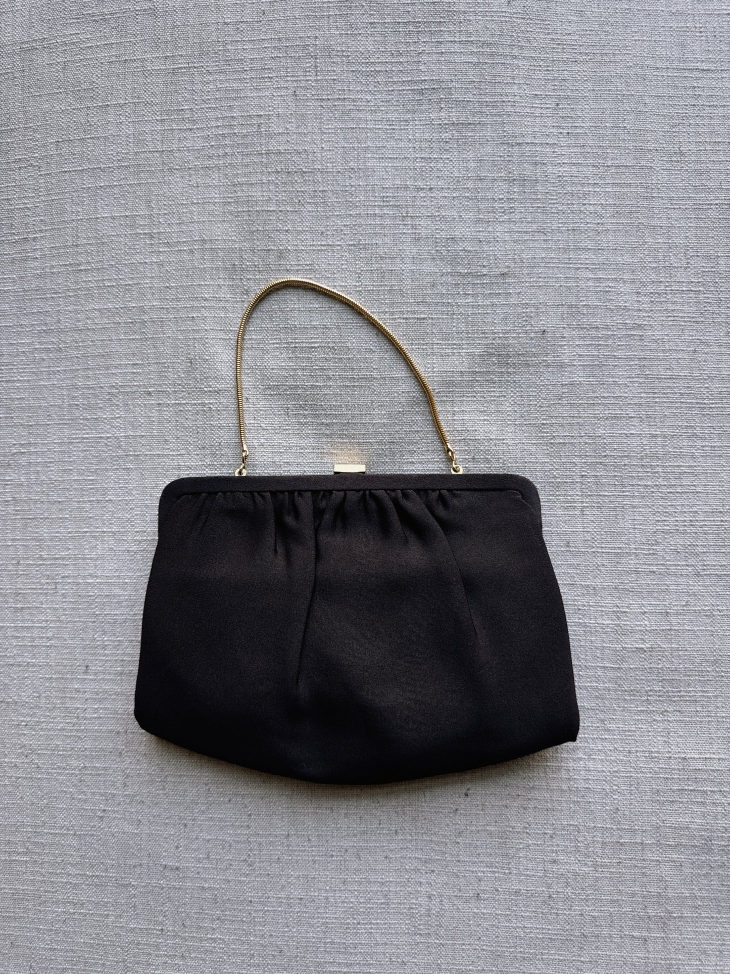 brown clutch bag