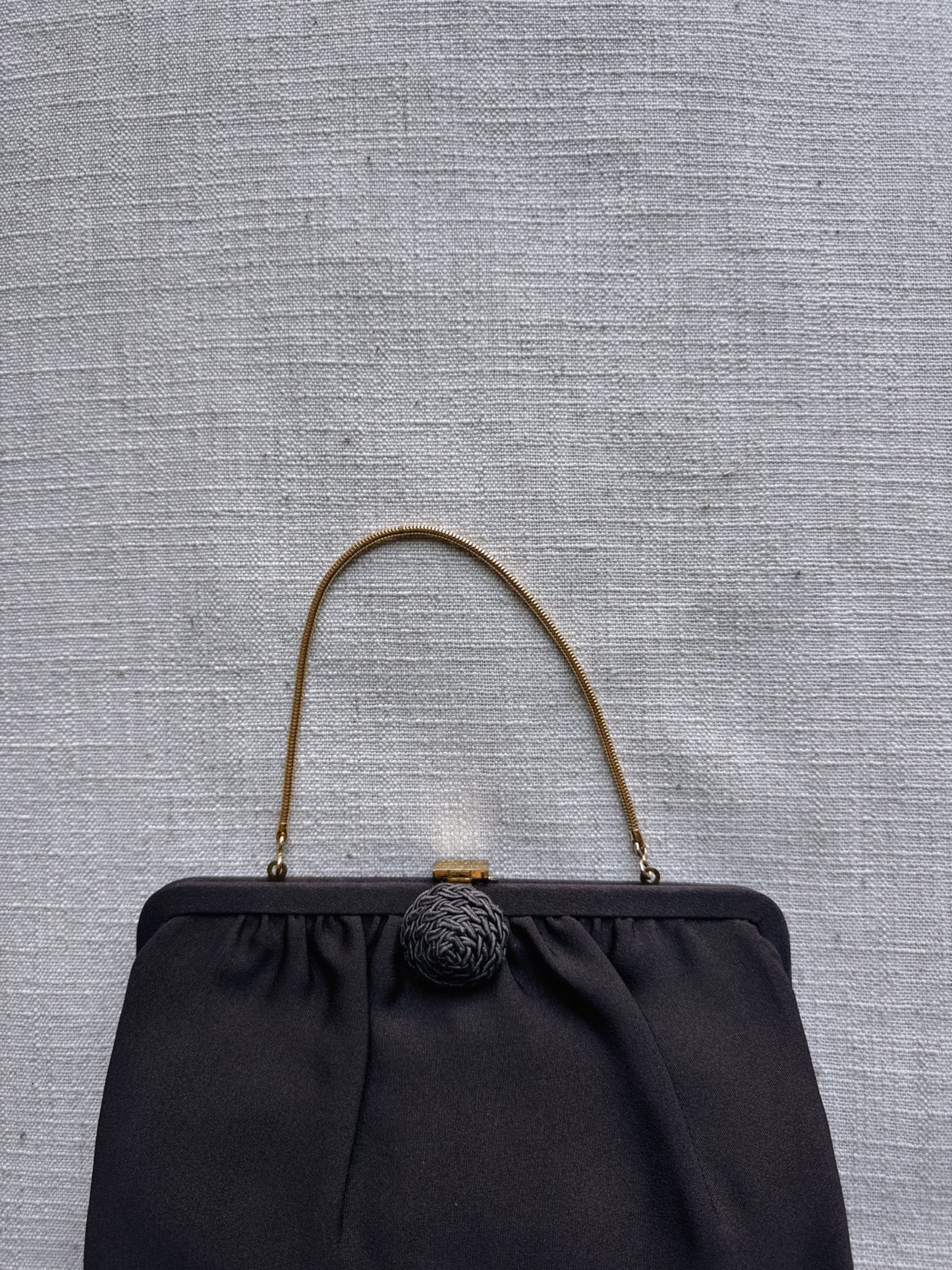 brown clutch bag