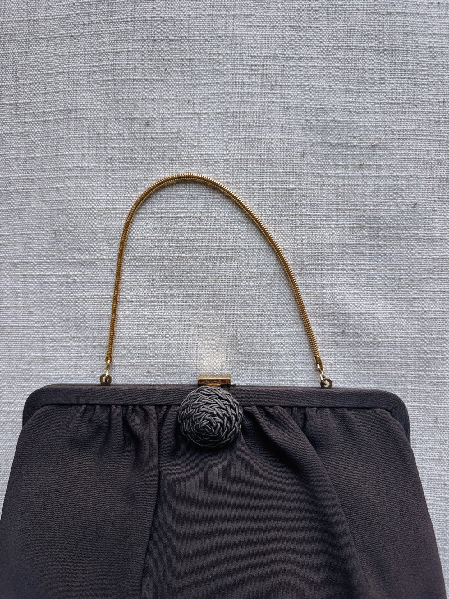 brown clutch bag