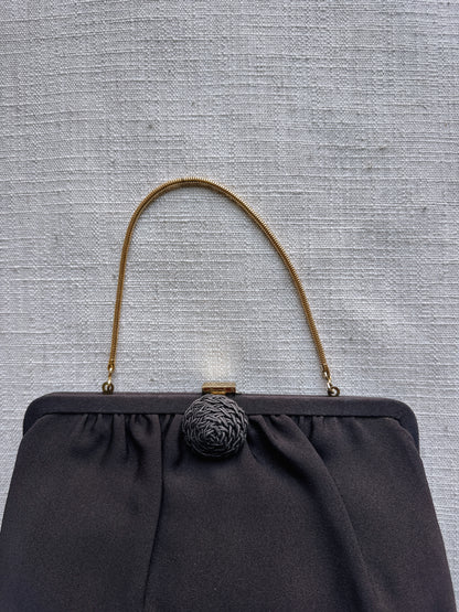 brown clutch bag