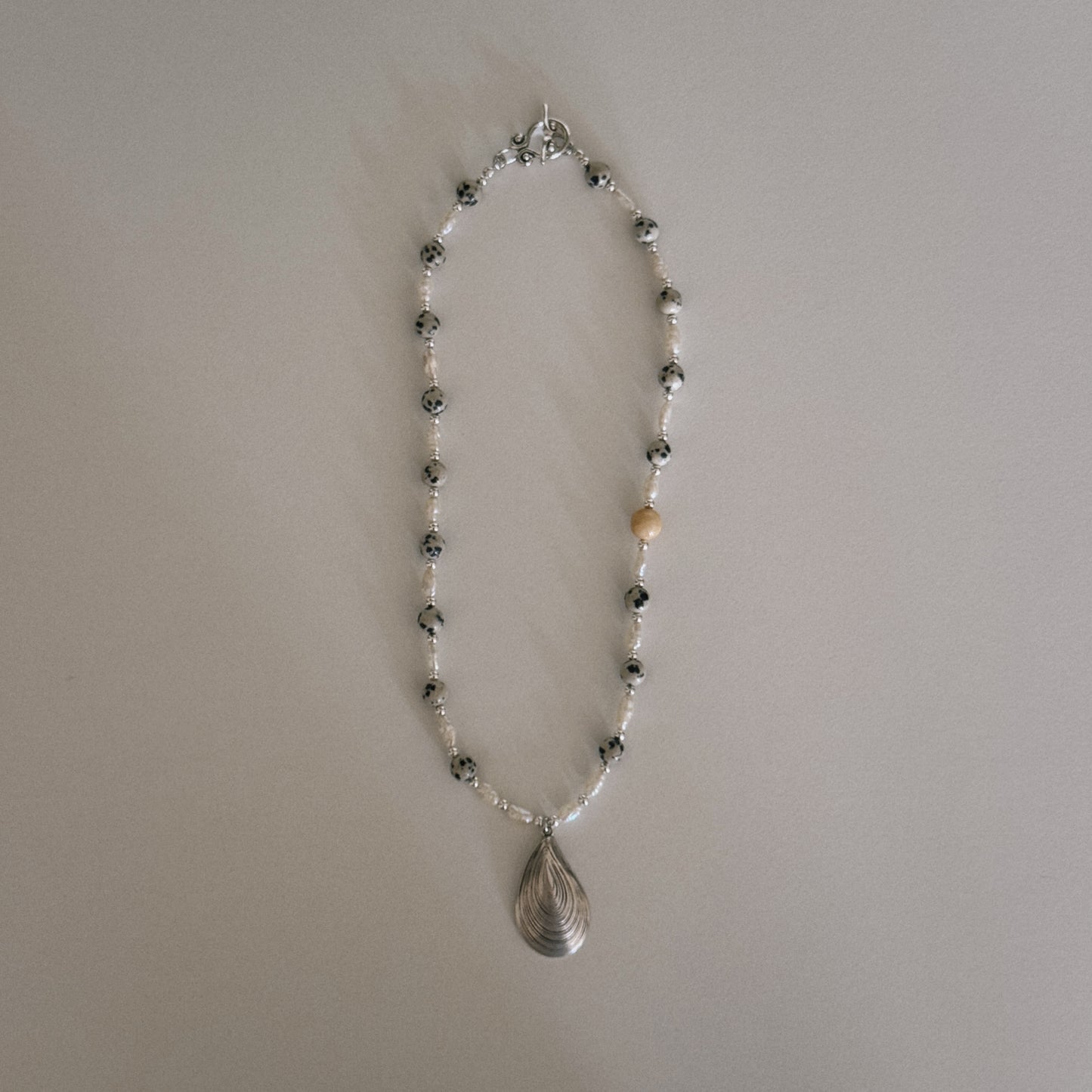 dalmation & pearl beaded necklace with oyster pendant