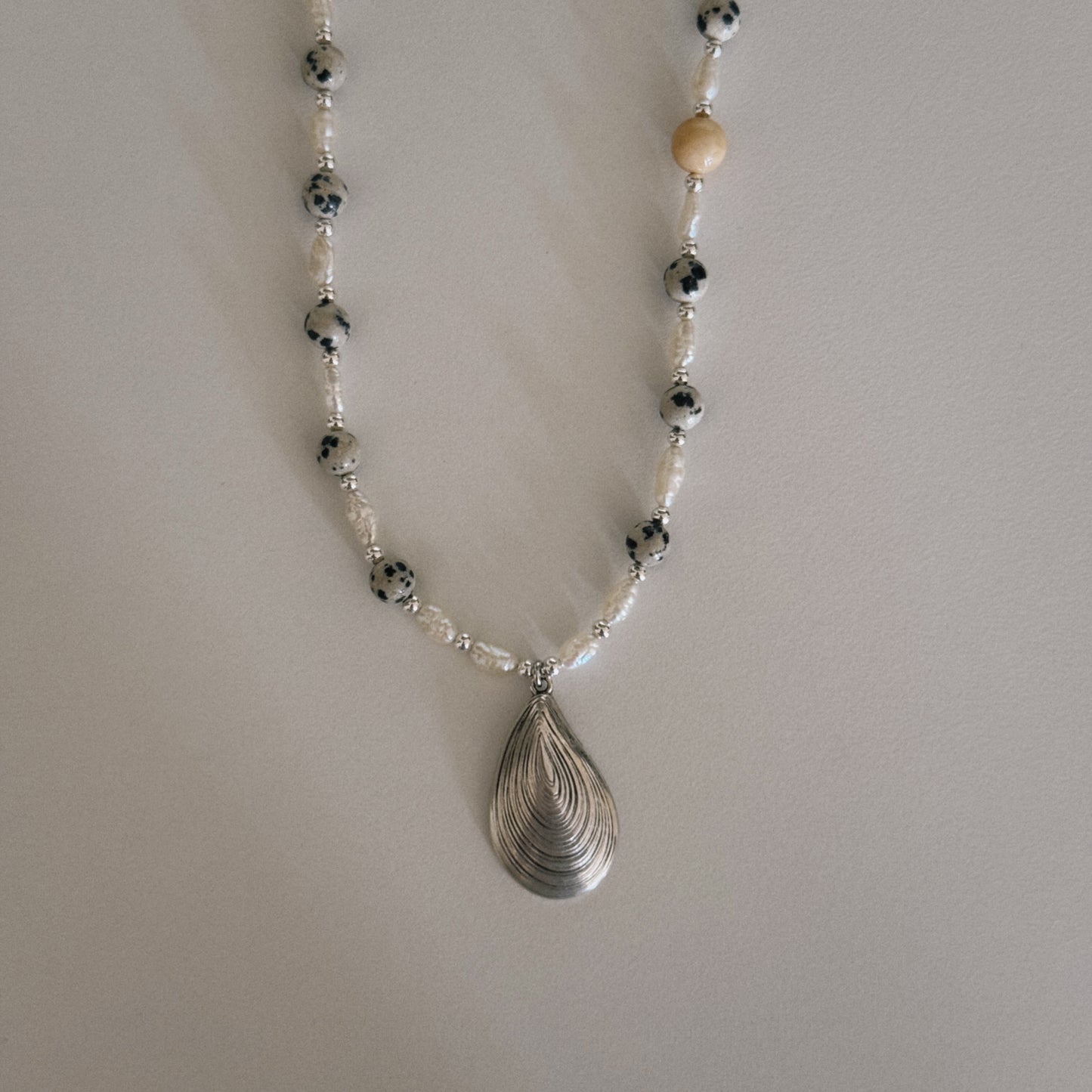 dalmation & pearl beaded necklace with oyster pendant
