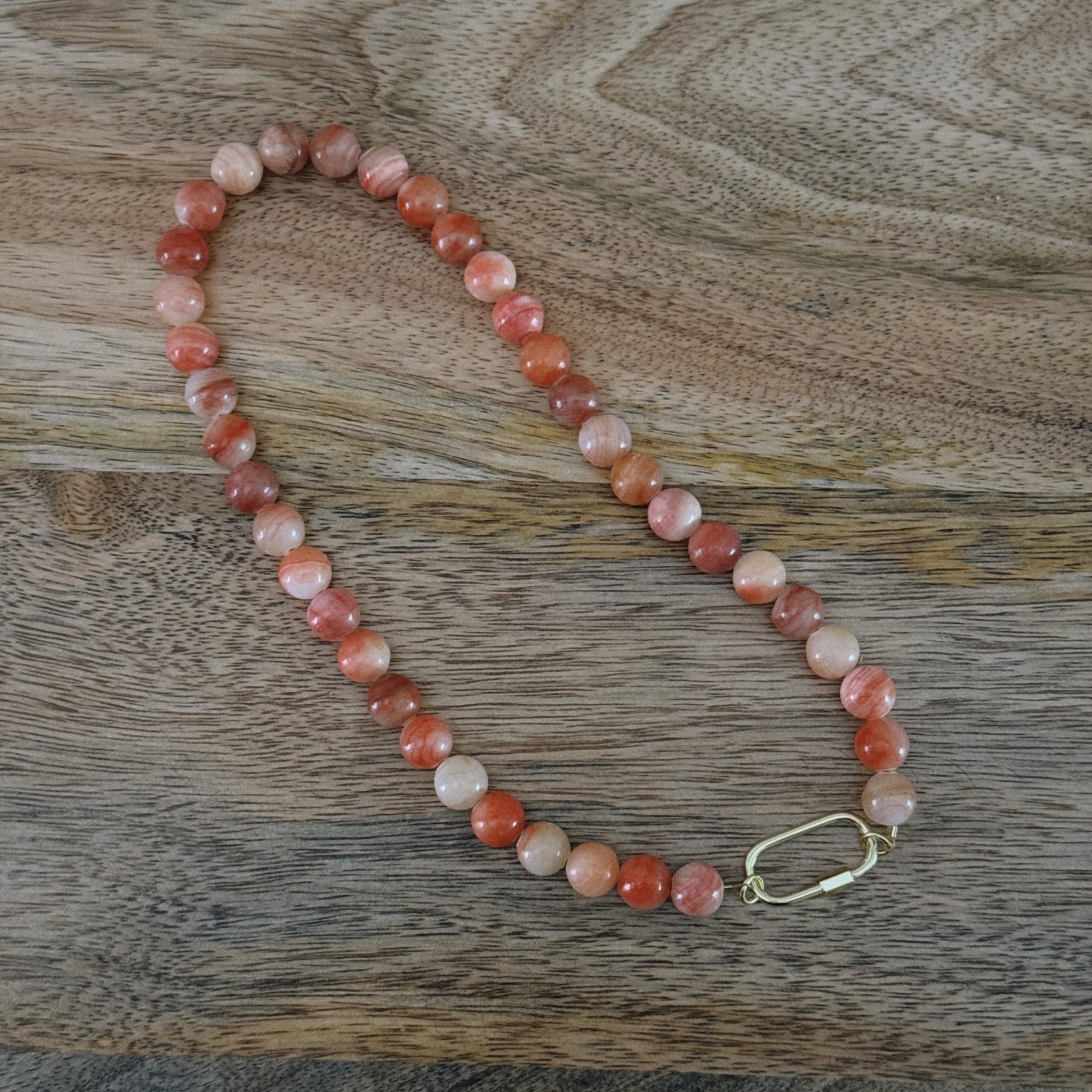 bright pink glass beaded necklace with 18k gold filled carabiner