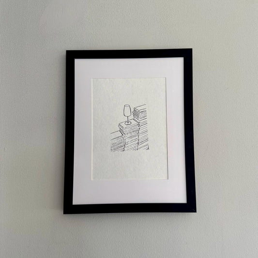 framed stack of books wall art print on white handmade paper