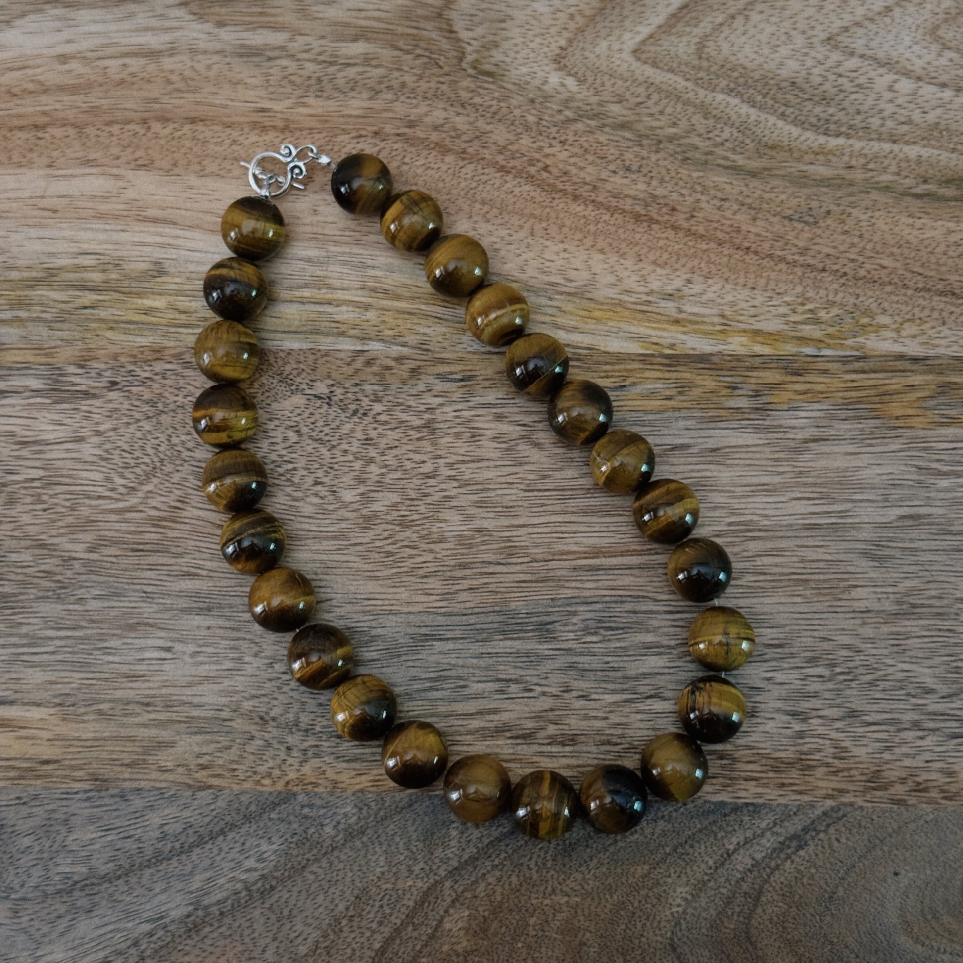 large brown glass beaded necklace with antique silver clasp