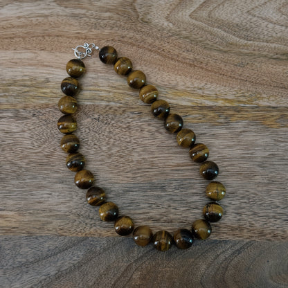 large brown glass beaded necklace with antique silver clasp
