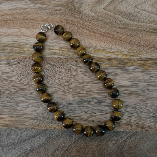 large brown glass beaded necklace with antique silver clasp