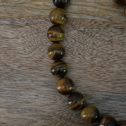 large brown glass beaded necklace with antique silver clasp