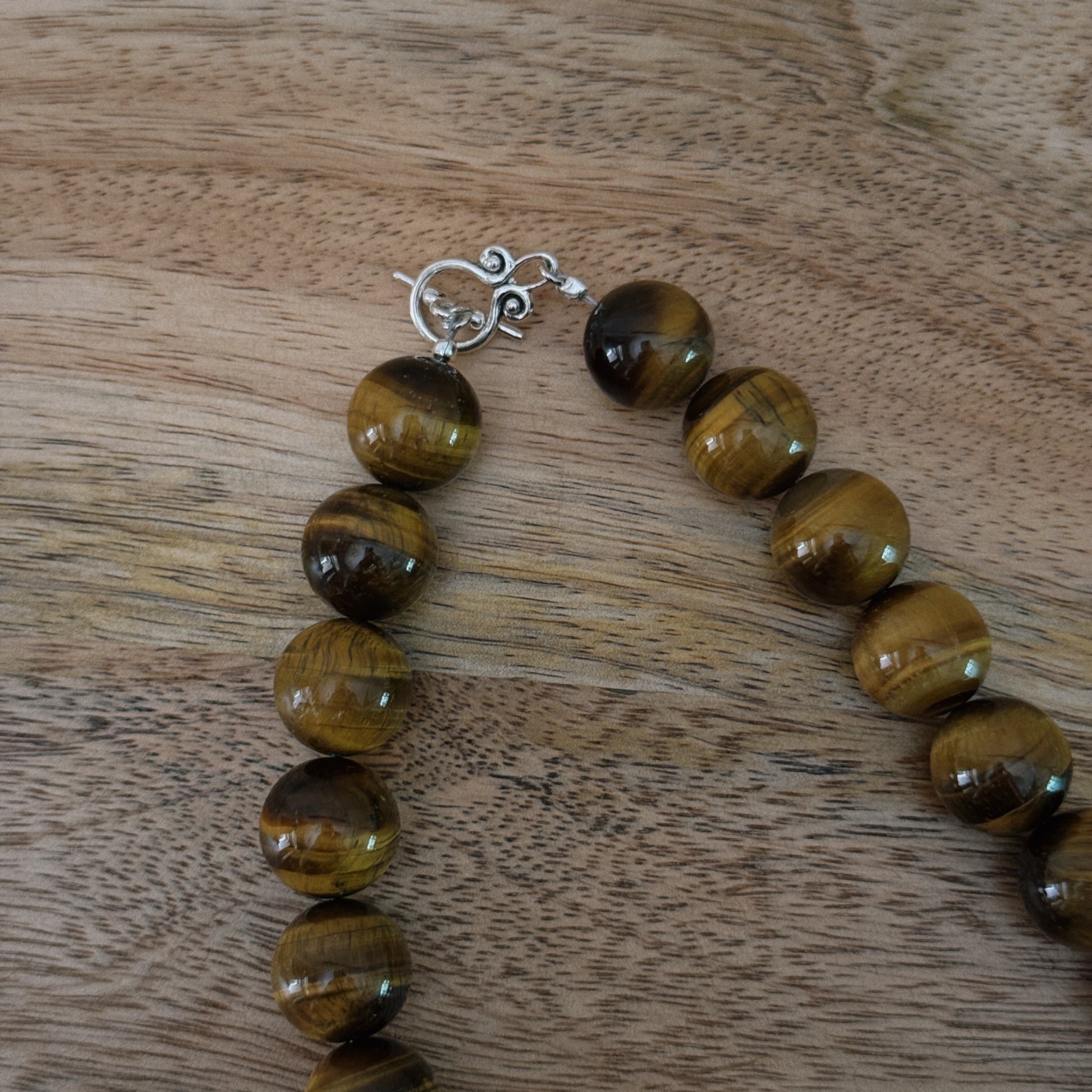 large brown glass beaded necklace with antique silver clasp