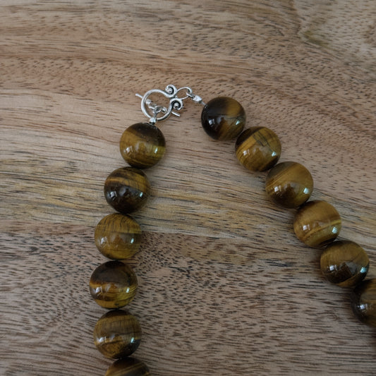 large brown glass beaded necklace with antique silver clasp