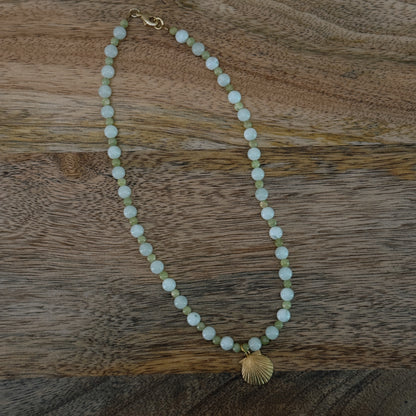 green and blue glass beaded necklace with brass seashell charm and 18k gold filled lobster clasp