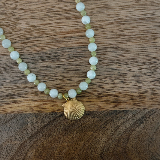 green and blue glass beaded necklace with brass seashell charm and 18k gold filled lobster clasp