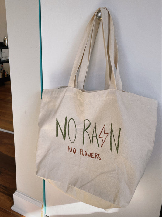 no rain, no flowers tote bag