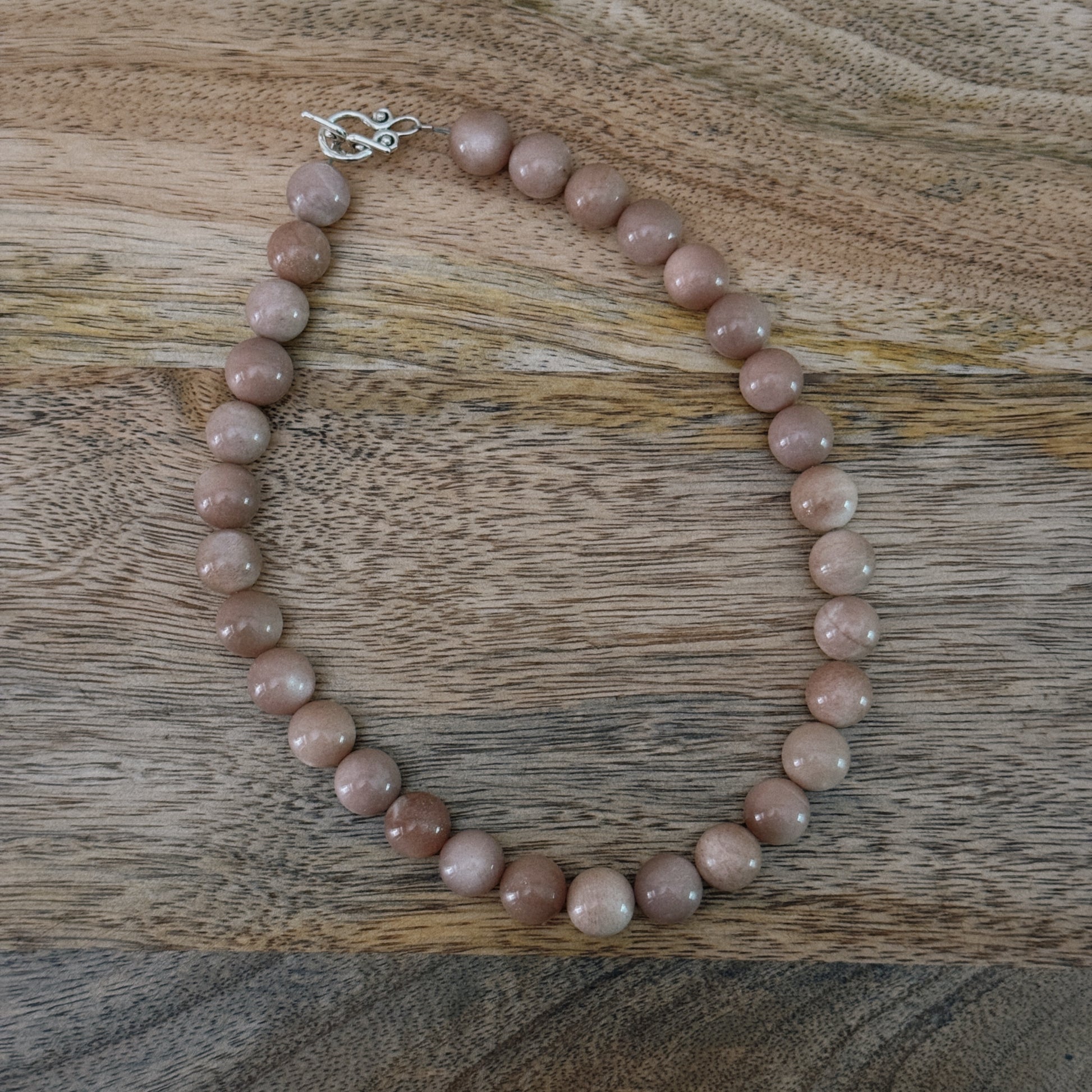 large glass pink beaded necklace with silver antique clasp