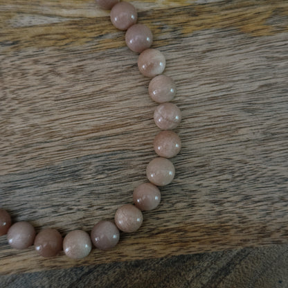 large glass pink beaded necklace with silver antique clasp