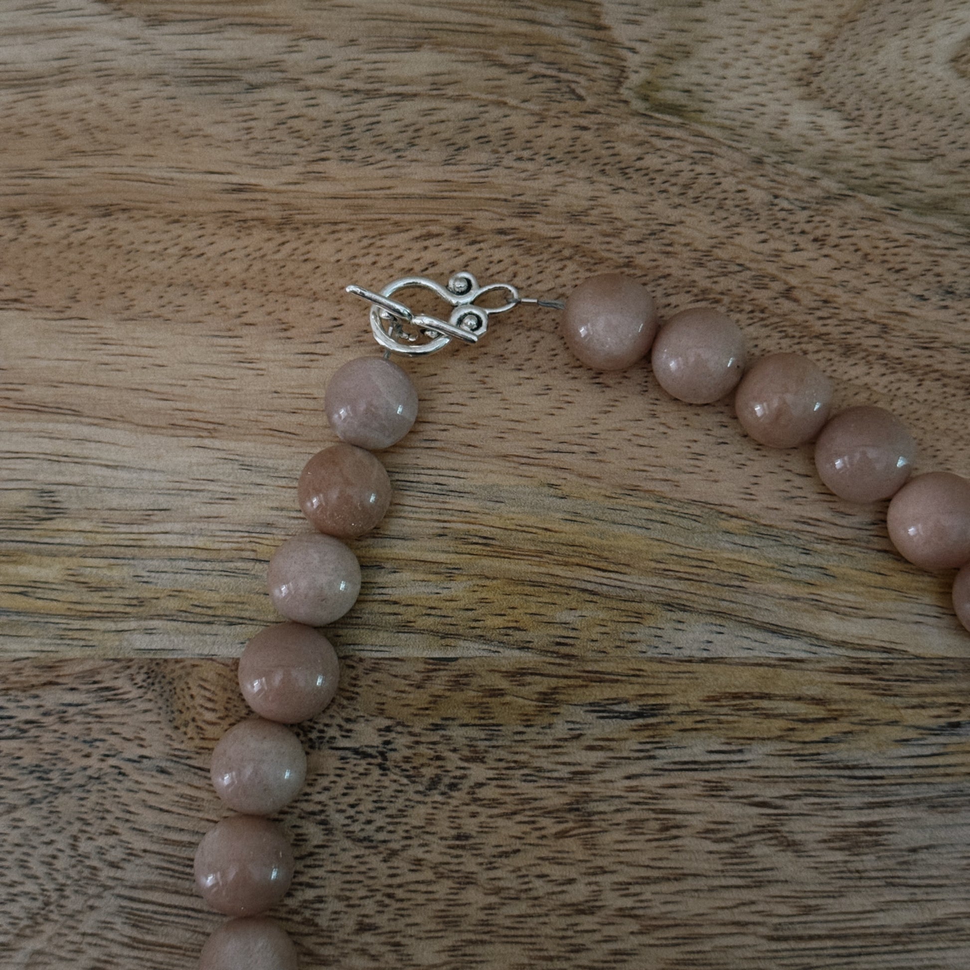 large glass pink beaded necklace with silver antique clasp