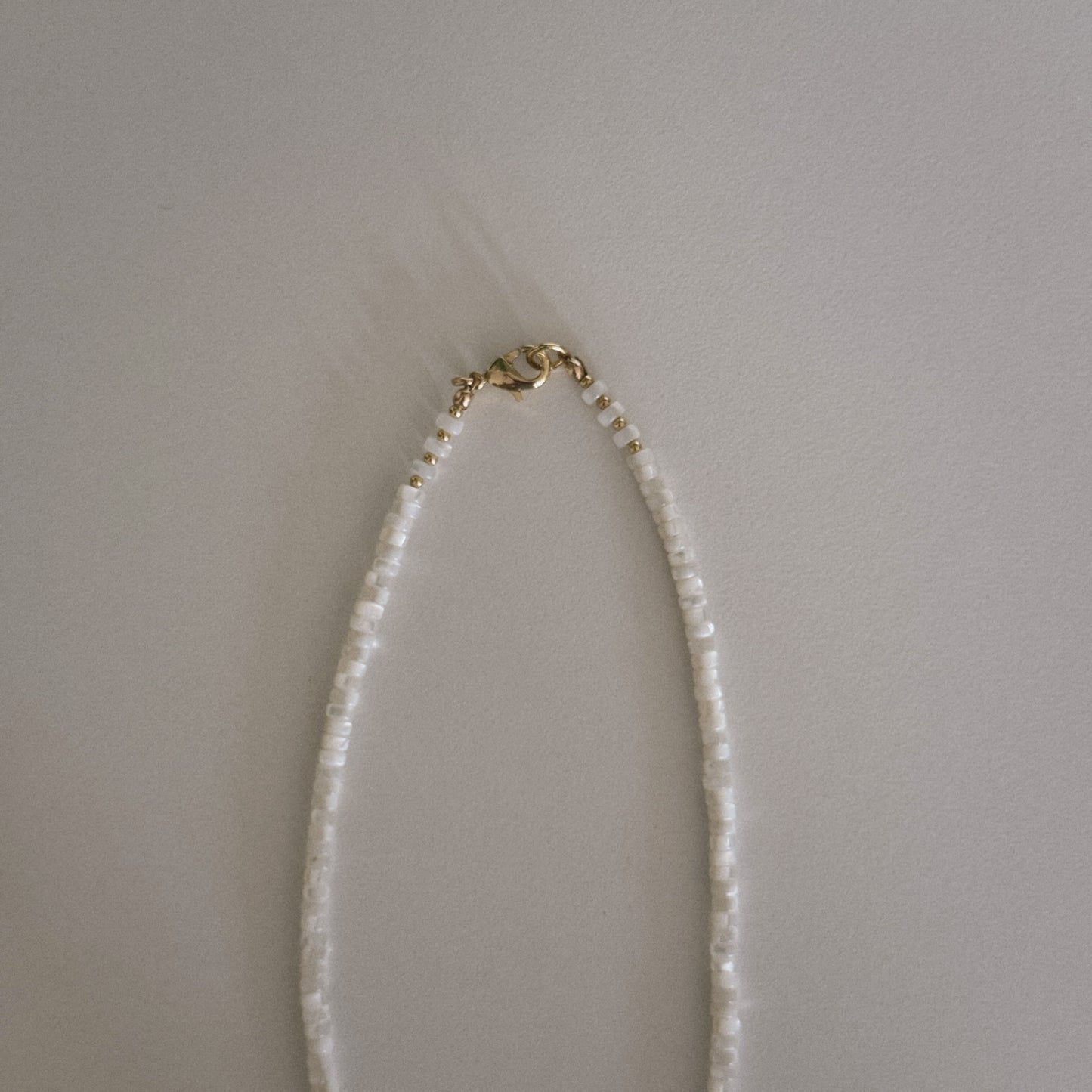 short mother of pearl beaded necklace