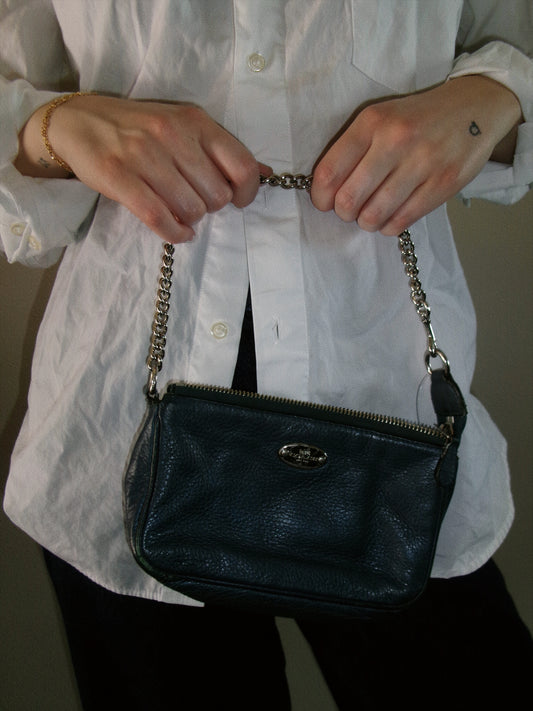 small blue coach handbag