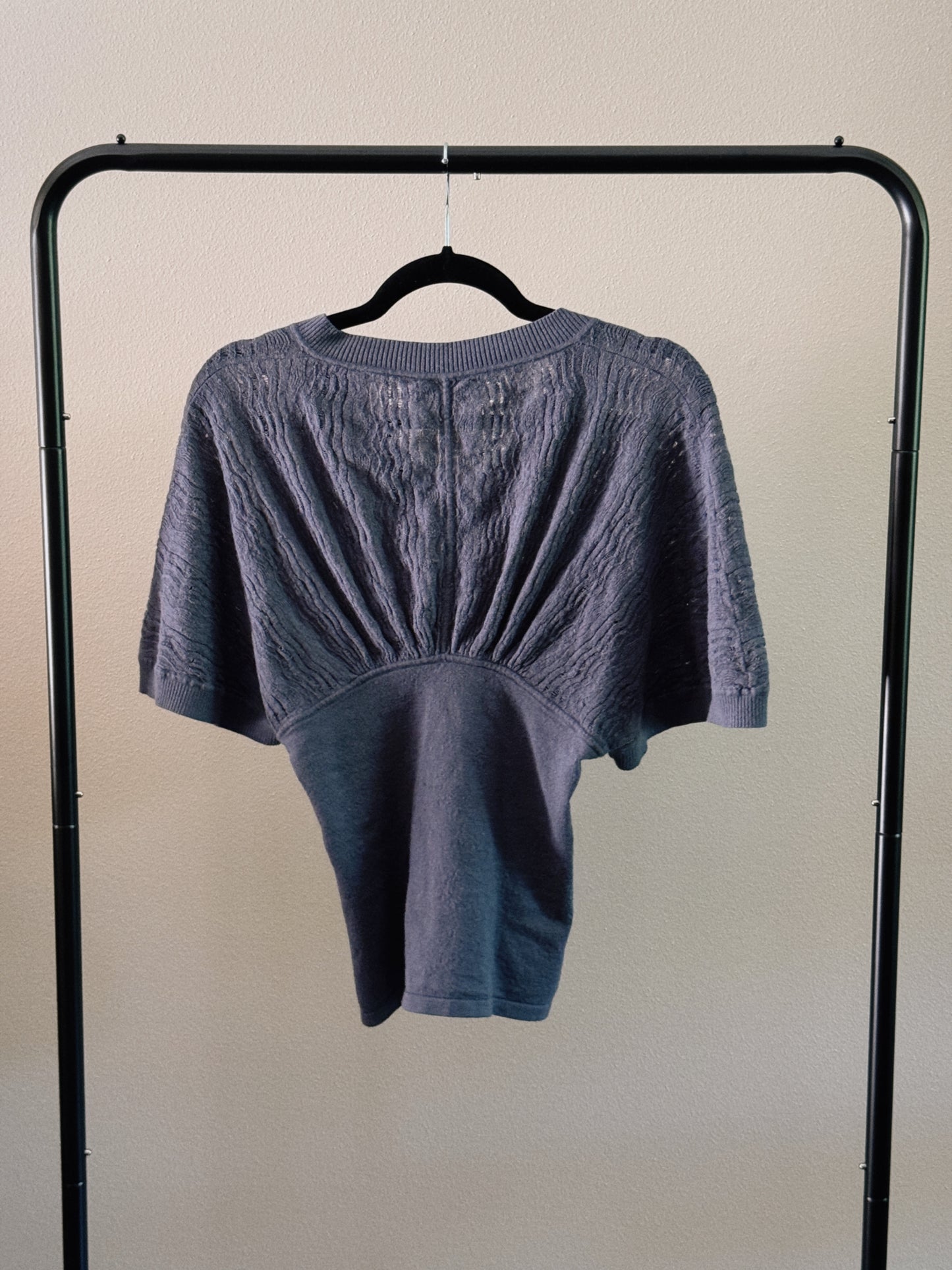 blue knit top