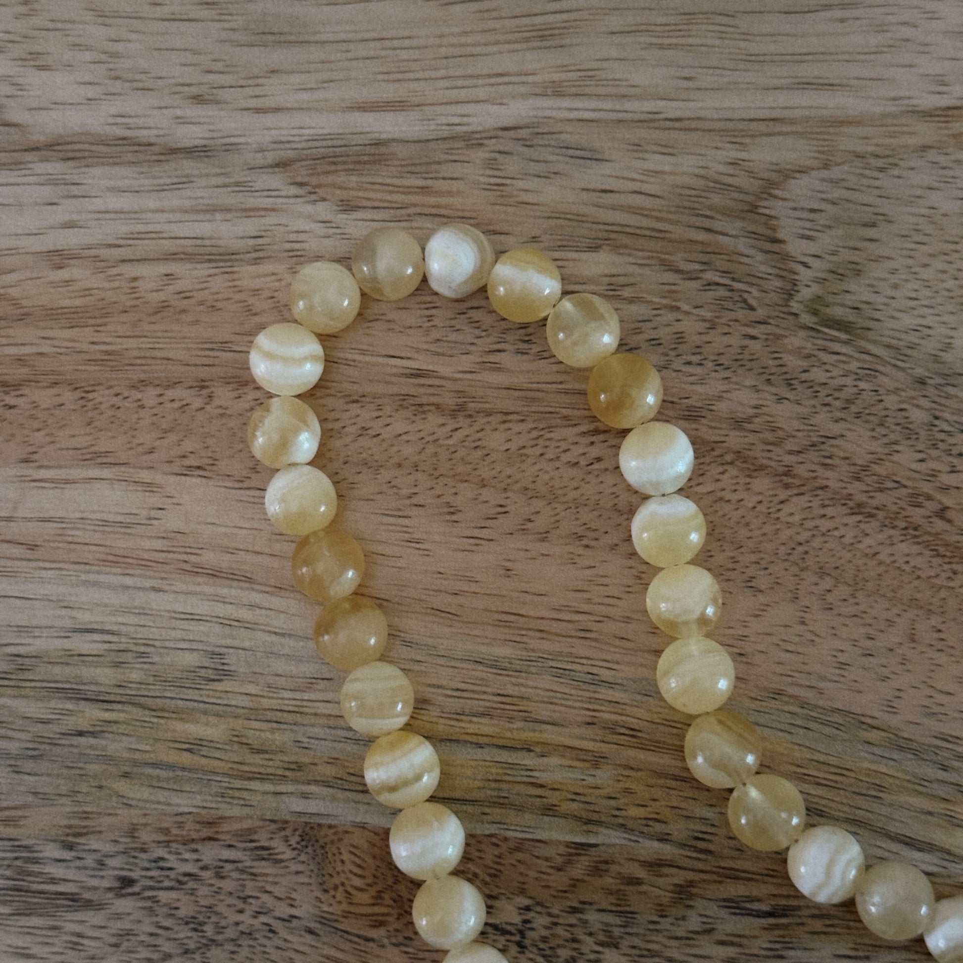 yellow glass beaded necklace with 18k gold filled carabiner