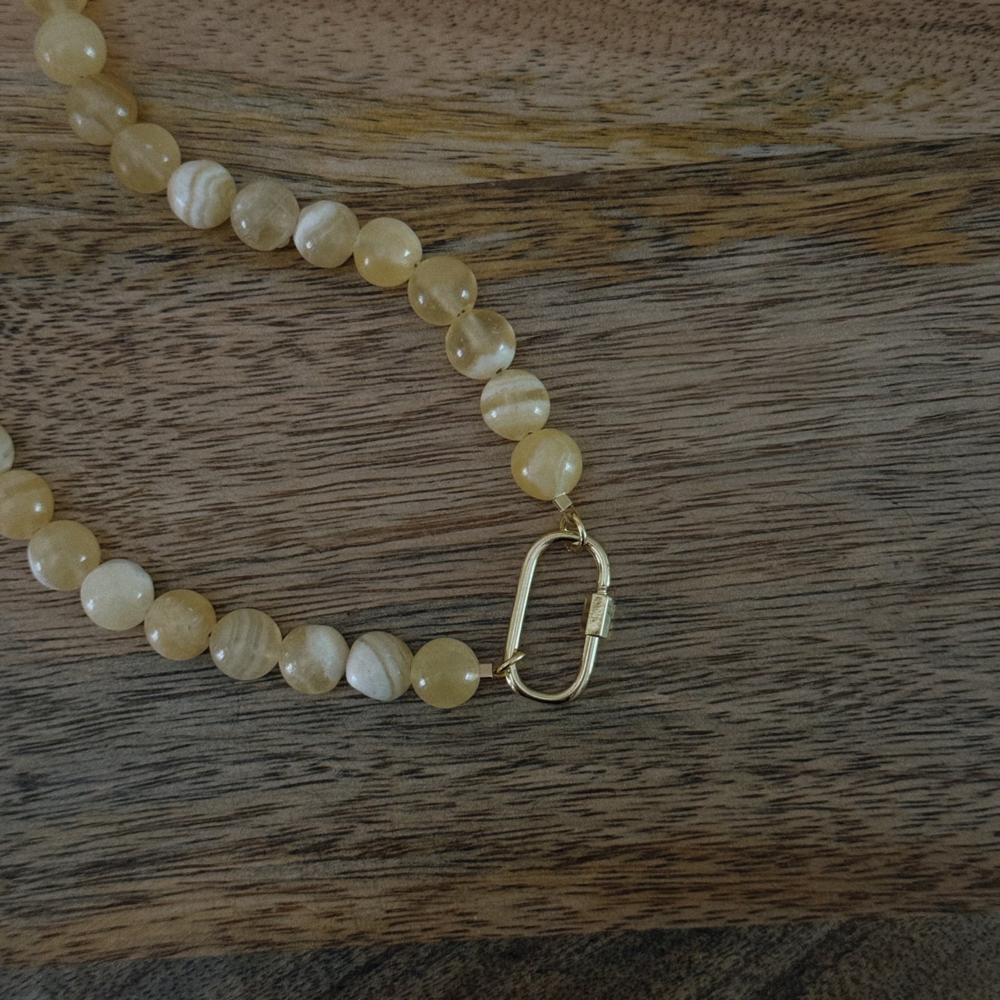 yellow glass beaded necklace with 18k gold filled carabiner