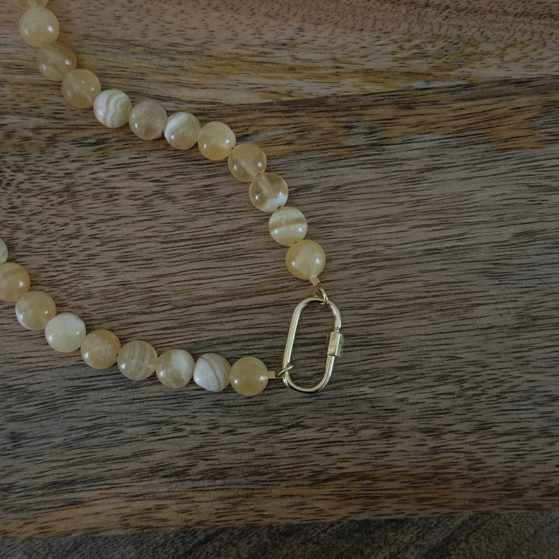 yellow glass beaded necklace with 18k gold filled carabiner